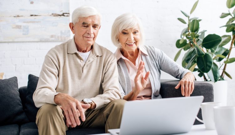 Elderly couple taking laptop video call