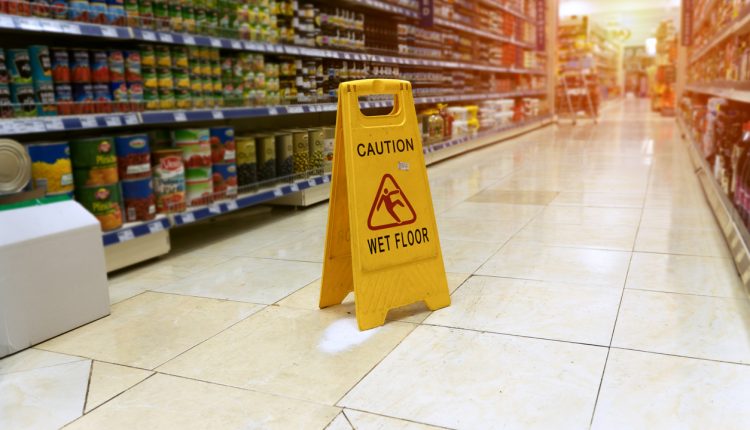 Wet floor sign in a supermarket