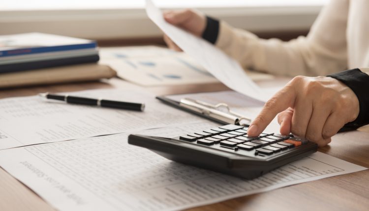 Accountant calculating payroll