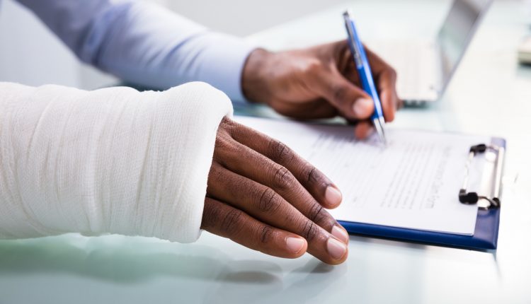 Injured man filing an insurance claim