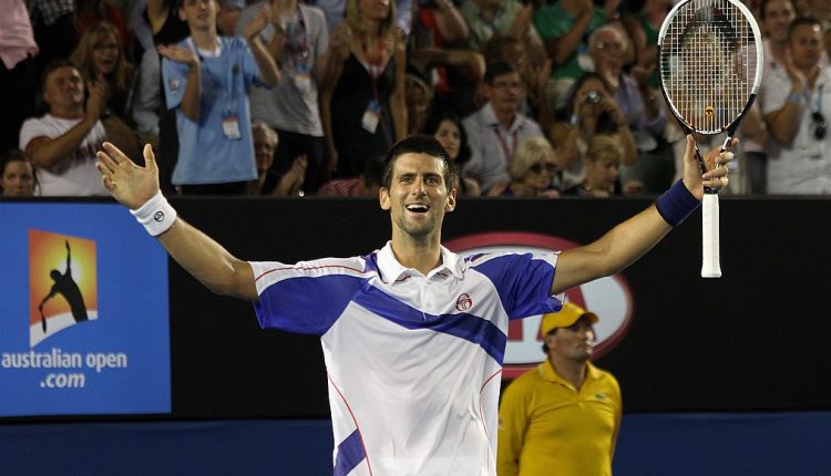Novak Djokovic celebrating his 2011 Australian Open final win over Andy Murray