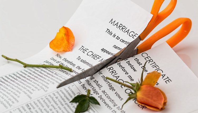 Marriage papers cut, divorce concept