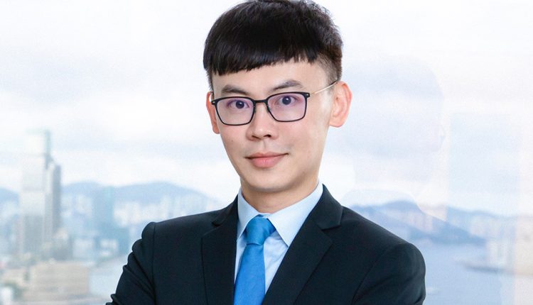 Hong Kong ADR specialist in a business suit.