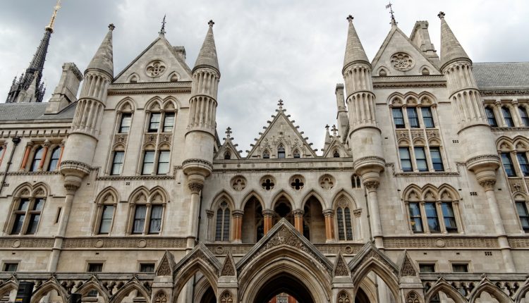 The Royal Courts of Justice on an overcast day.
