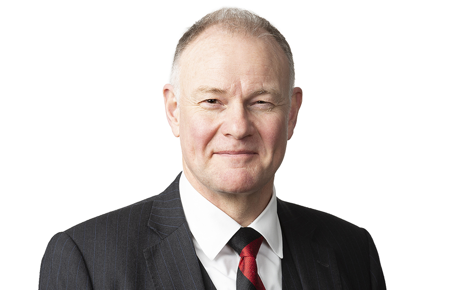 Notable insolvency practitioner Alan Roberts standing before a white background.