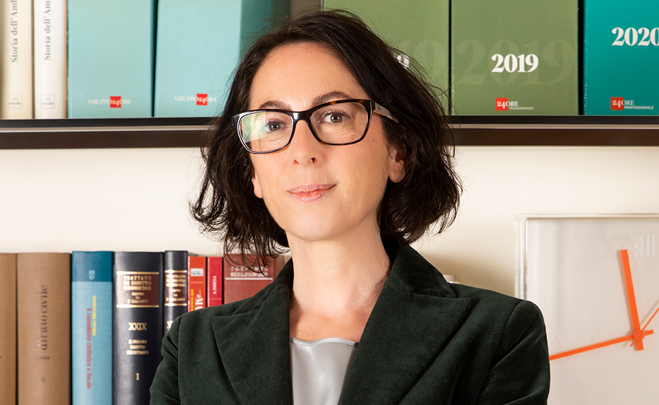 Criminal lawyer Licia Dal Pozzo standing in her office.