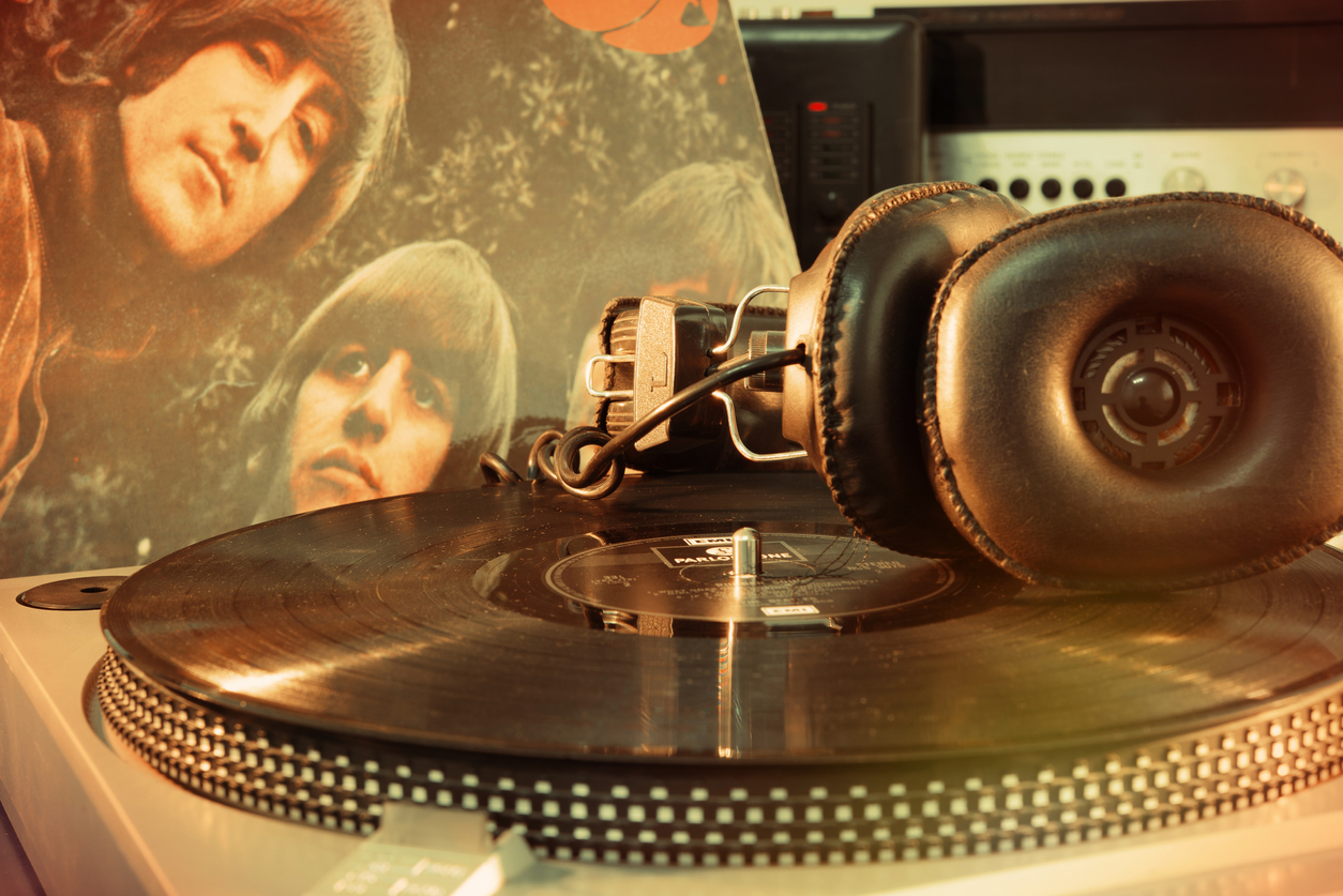 The Beatles' Rubber Soul album and a record player.