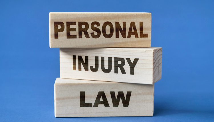 Personal Injury Law, text words typography written on wooden blocks, life and business concept
