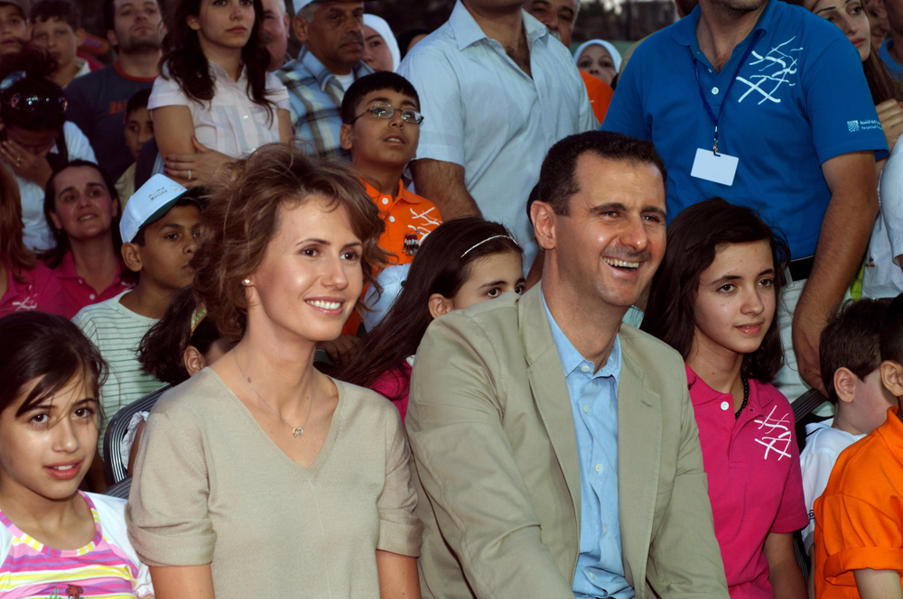 Britain has been urged to revoke the passport of Bashar al-Assad's wife and impose a permanent ban on her entry into the UK due to concerns that she may divorce the dictator and attempt to return to the country