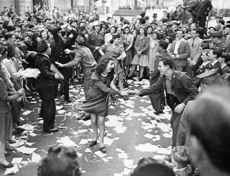 Dancing in the streets: Strangers twirled, laughed, and embraced as joy spilled across Britain’s cities on VE Day—celebrating peace after six long years of war.