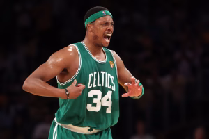 Paul Pierce celebrating during a Boston Celtics game wearing number 34 jersey.