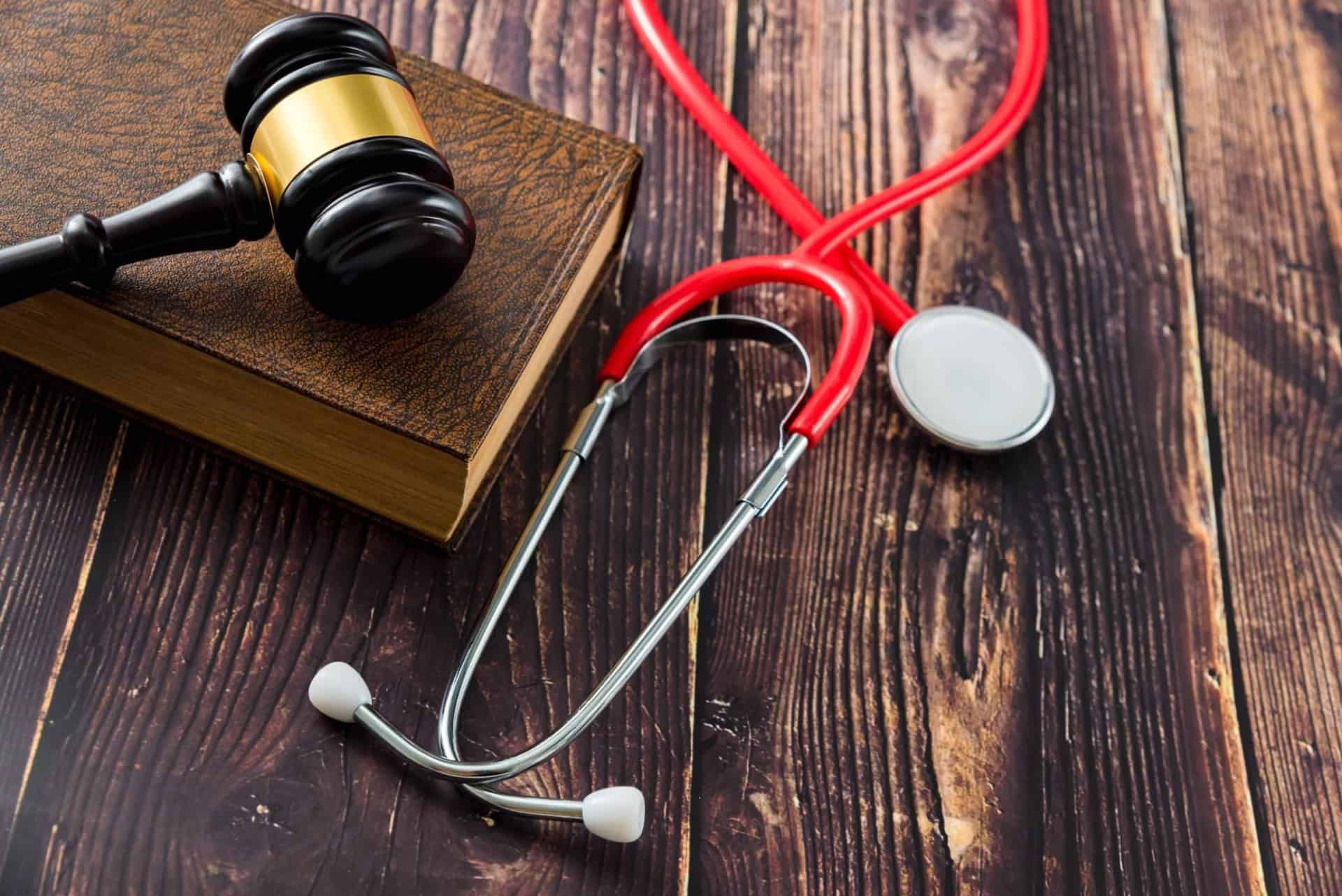 a gavel resting beside a stethoscope