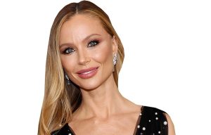Georgina Chapman close-up portrait in Marchesa black pearl-embellished gown.