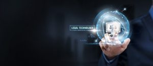legal technology: businessman touching legal technology icon and global network. compliance, efficiency.