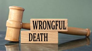 wrongful death words on wooden blocks with a judge's gavel in the background