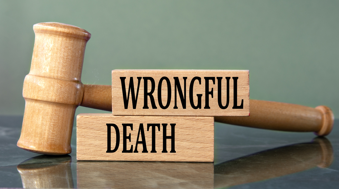 wrongful death words on wooden blocks with a judge's gavel in the background