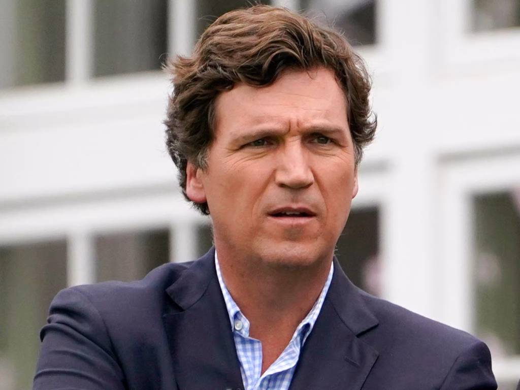 Carlson's Fury Erupts: Student Revives CIA Conspiracy, Triggering Physical Threat — But Did He Break the Law?