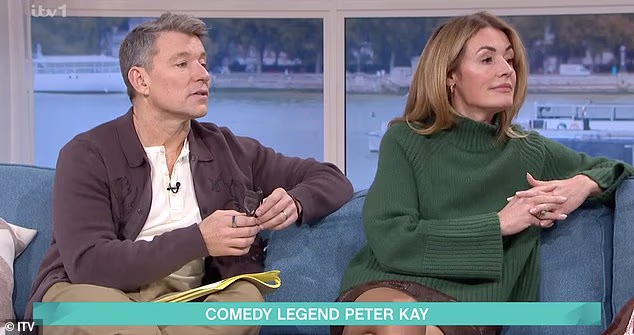 Ben Sheppard Peter Kay and Cat Deeley during a live This Morning interview as he pauses mid-discussion.