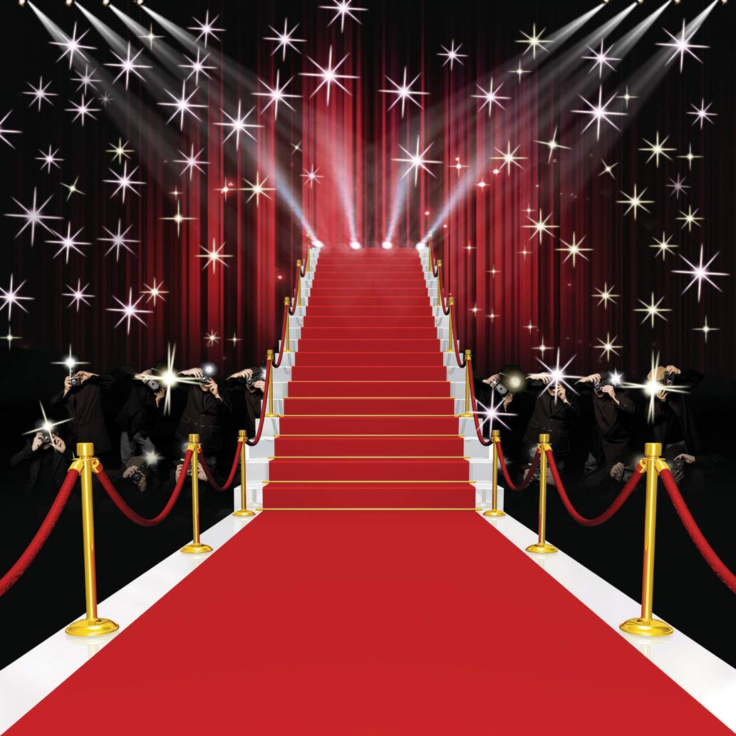 Red carpet staircase with velvet ropes and photographers in a staged event setting