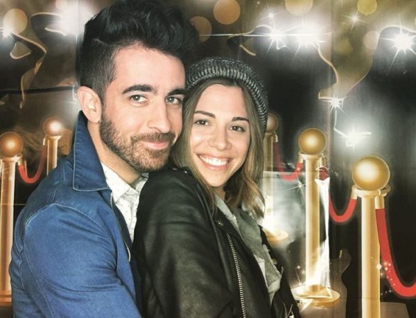 Christina Perri and Paul Costabile smiling together before their divorce announcement.