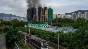Smoke rises from the complex Hong Kong