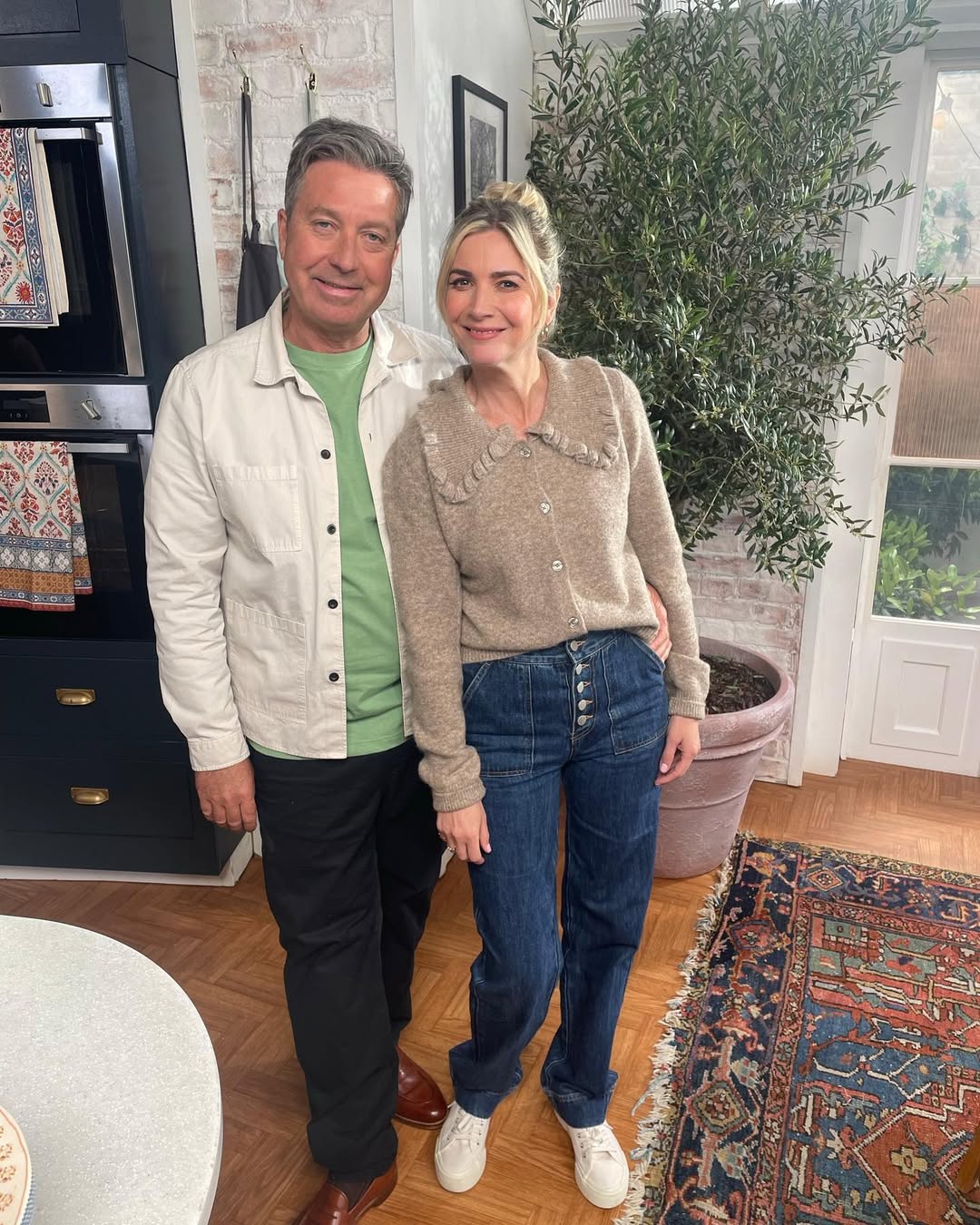 Lisa Faulkner stands by John Torode.