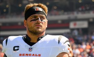 Logan Wilson, former Cincinnati Bengals captain, stands on the sideline during a game, wearing his Bengals uniform and black eye paint, before his trade to the Dallas Cowboys.