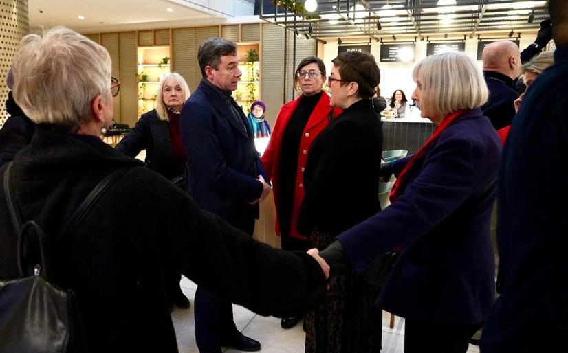 Anti-pollution protesters surround Southern Water CEO Lawrence Gosden inside a London conference venue during a citizen’s arrest attempt.
