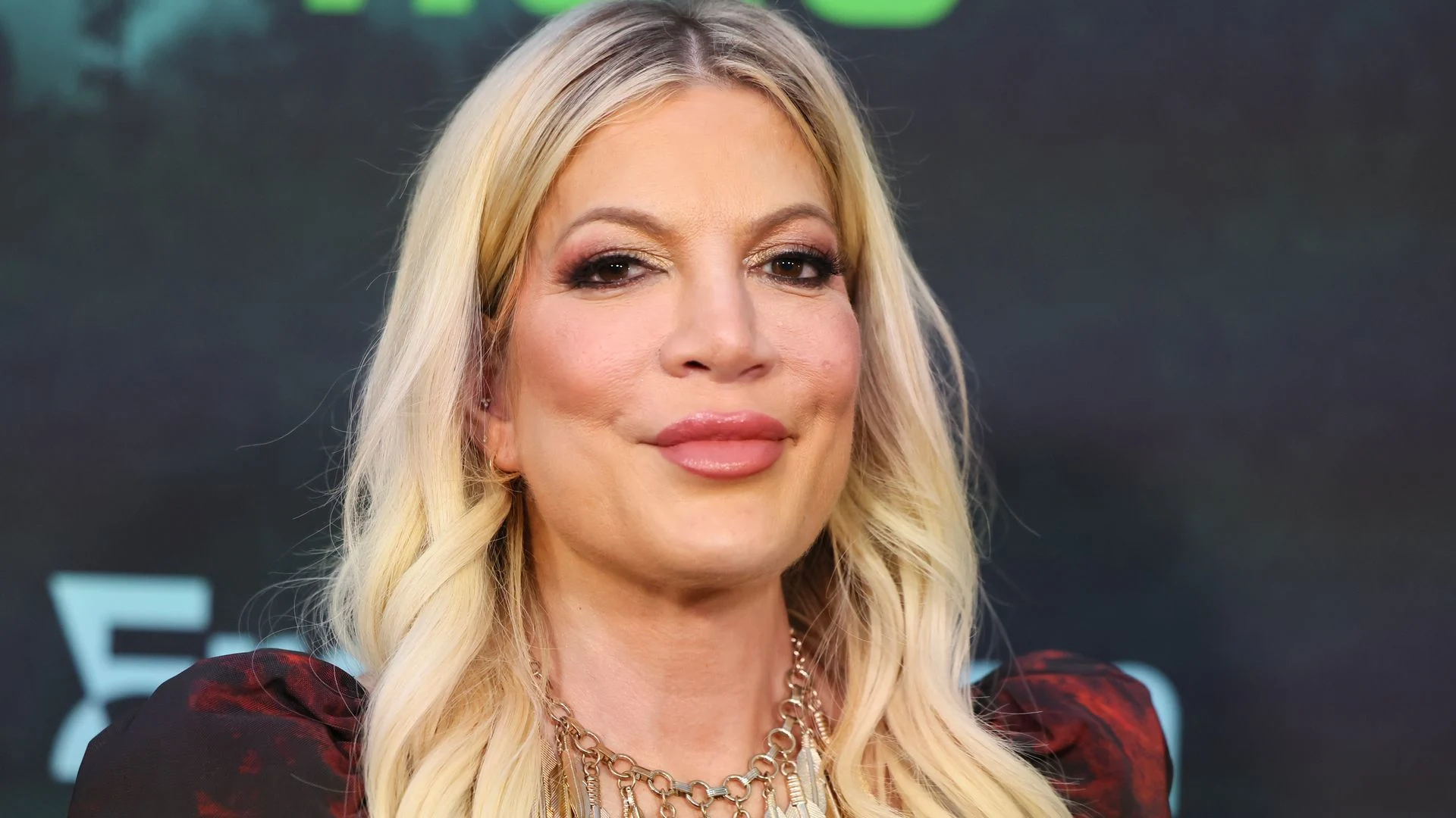 Tori Spelling attends a Hollywood event in Los Angeles, appearing confident following her finalized divorce from Dean McDermott.