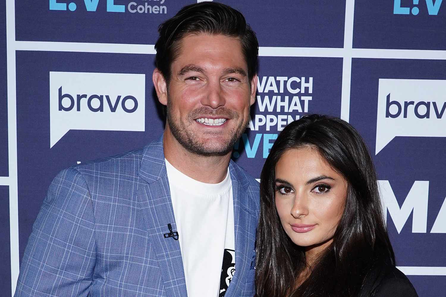 Reality TV stars Craig Conover and Paige DeSorbo smiling for a photo.