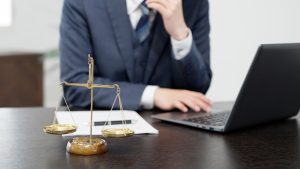 the hands of a businessman conducting a survey on a computer