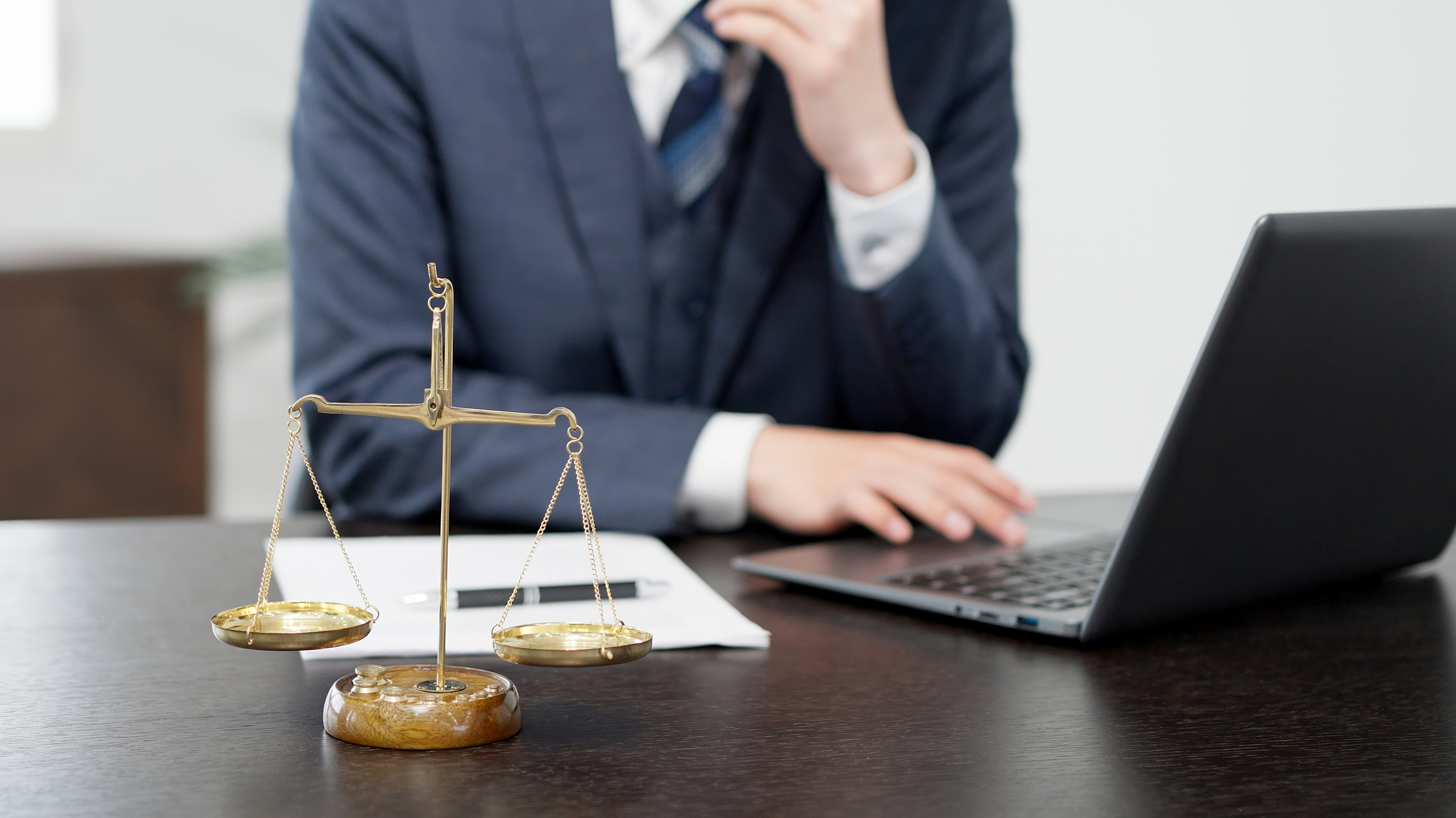 the hands of a businessman conducting a survey on a computer