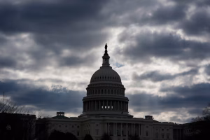 Dark clouds hang over the U.S. Capitol building in Washington, symbolizing political tension and loss of public trust
