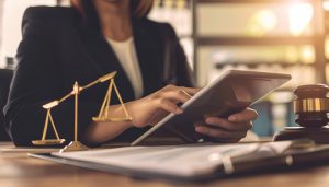 Executive reviewing legal documents amid regulatory and compliance risk