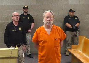 Actor Timothy Busfield appears in court wearing a jail-issued uniform during a pretrial hearing