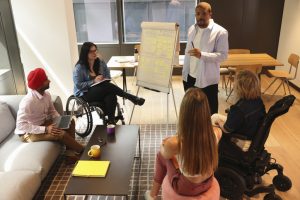 diverse group of business people during presentation in office