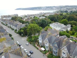 House deed showing multiple owners, illustrating shared property ownership risk